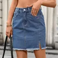 Detail of blue washed denim mini skirt with side slit and frayed hem. - S / Bottoms / Dark Blue