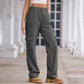 Detailed view of women's dark grey cargo pants featuring side pockets and elastic waist - S / Bottoms / Gray