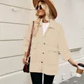 Detailed street style look of a beige oversized vintage denim jacket for women. - S / Tops / Regular Fit / Light Khaki