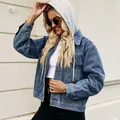 Detailed view of women's washed blue denim jacket featuring a grey cotton drawstring hood - S / Tops / Blue Hooded