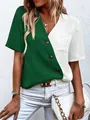 Close-up of a green and white color-block V-neck blouse with diagonal brown buttons - S / Tops / Green