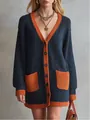 Close-up of navy blue knit cardigan featuring vibrant orange contrast trim and pockets. - S / Tops / Navy Blue And Orange Contrast