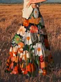 Detailansicht eines Maxirocks im Boho-Stil mit einem kunstvollen Blumenmuster in Ölfarben-Optik - S / Unterteile / Orange