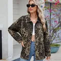 Stylish retro leopard print oversized denim jacket for women in a casual outdoor setting - S / Tops / Regular Fit / Leopard Print