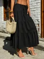 Boho black tiered maxi skirt with elastic drawstring waist and elegant pleated texture. - S / Bottoms / Black