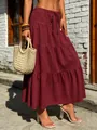 Bohemian maroon tiered maxi skirt with drawstring waist and textured fabric detail - S / Bottoms / Burgundy