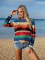 Close-up detail of a vibrant rainbow striped hollow crochet knit beach cover-up on a model - S / Tops / Sapphire Blue