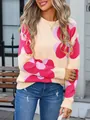 Detailed view of women's fashion crew neck sweater featuring vibrant pink floral print designs - Purple Rose Contrast