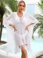 Detailansicht eines weißen Häkel-Strand-Cover-ups mit Quasten und Lochmuster. - Einheitsgröße / Oberteile / Weiß