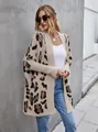 Full-body view of a stylish loose-fit leopard print knit cardigan sweater on a model - S / Tops / Khaki