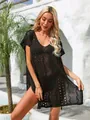 Detailed view of black crochet knit beach cover-up with intricate hollow patterns. - One Size / Tops / Black
