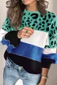 Close-up detail showing the colorful leopard print patchwork knit sweater round neck - Blue