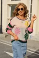 Close-up of the vibrant floral patchwork and striped sleeves on this round neck knit sweater - S / Tops / Green