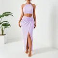 Lavender two-piece set featuring halter crop top and ruched slit maxi skirt - Light Purple