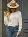Stylish white knit sweater featuring pink daisy floral patterns and a classic crew neck - S / Tops / White