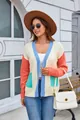 Retro color-block knit cardigan with pockets, shown on a model in an outdoor setting. - S / Tops / Off White