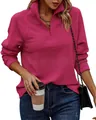 Detailopname van een roze geribbelde damessweatshirt met een halve rits en kraag. - Rozerood