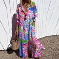 Elegant colorful floral print maxi dress with button lapel and pleated texture details - S / Dresses / Multicolor Abstract Print