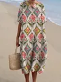 Detail van een maxi-jurk met vintage bloemenprint en een stijlvolle Peter Pan-kraag. - XS / Jurk (Stijl 15) Roze Ruitjes Bloemenpatroon