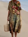 Detailweergave van een vintage maxi-jurk met bloemenprint en Peter Pan-kraag op het strand - XS / Jurk (Stijl 18) Vintage Roos en Europees Patroon