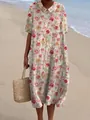 Zomerse maxi-jurk met bloemenprint en Peter Pan-kraag getoond op het zonnige strand - XS / Dresses / Lichtgroene lichtgele bloemenprint (Stijl 7)