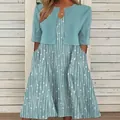 Elegant teal V-neck midi dress featuring light blue cardigan and white vertical stripes - S / Top And Bottom / Green Polka Dot