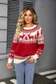 Detailed view of red Christmas knit sweater with reindeer and snowflake jacquard. - S / Tops / Red
