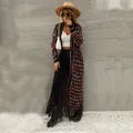 Long colorful plaid knit cardigan with fringe hem on model - S / Tops / Purple