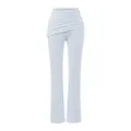 Détail du pantalon évasé bleu clair avec une taille drapée asymétrique élégante. - S / Bas / Bleu Clair (Pantalon)