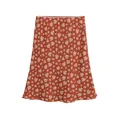 Gros plan d'une jupe mi-longue couleur terre cuite à fleurs blanches avec bord en dentelle - S / Floral Rouge