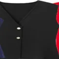 Élégant gilet en maille noire ajustée pour femme avec deux boutons dorés décoratifs - S / Hauts / Noir