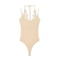 Elegant beige halter neck bodysuit featuring a delicate white lace patchwork trim. - Yellow