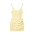 Pale yellow sleeveless mini dress with elegant square neckline and ruched skirt details - Yellow