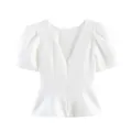 Elegante witte blouse met pofmouwen, een diepe V-hals en peplum taille detail - XS / Tops / Wit