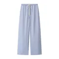 Front view of light purple wide-leg drawstring trousers with elastic waist and loose fit - S / Bottoms / Light Blue