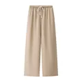 Detailed view of khaki wide-leg casual pants featuring an elastic drawstring waist. - Khaki