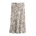 Close-up view showing the silky satin texture and leopard print of this midi skirt - Spotted Stone