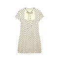 Detail view of cream polka dot mini dress featuring a bow tie and cutout neck. - Yellow Polka Dot