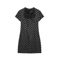 Close-up detail of black polka dot mini dress featuring a bow tie and cutout neckline. - Black Polka Dot