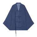 Detailweergave van een donkerblauwe blouse met lange mouwen en unieke traditionele knoopsluitingen - Marineblauw