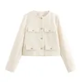 Close-up of cream tweed short jacket with elegant gold buttons and four flap pockets - Off White