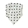 Detail view of a white polka dot strapless tube top featuring a handkerchief pointed hem - XS / Tops / Black Polka Dot