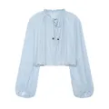 Detailed view of light blue crop top with ruffled collar and wooden bead drawstring - XS / Tops / Light Blue