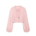 Close-up detail of a pink cropped blouse with ruffled collar and voluminous lantern sleeves - XS / Tops / Pink