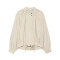 Vue détaillée d'une veste crème à manches lanterne avec col montant et ourlet à cordon - XS / Hauts / Beige