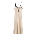 Detailed view of champagne satin slip dress with black contrast trim and V-neckline. - XS / Dresses / Beige