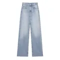 High-waisted straight-leg denim jeans for women in a vintage light blue wash. - XS / Bottoms / Light Blue