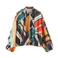 Primer plano de chaqueta holgada para mujer con vivos motivos geométricos de rayas - XS / Top (XX12636) / Multicolor