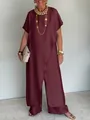 Sofisticato completo bordeaux con tunica asimmetrica e pantaloni larghi coordinati - Borgogna