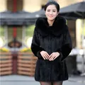 Detailed macro view of the luxurious black faux rabbit fur texture and fluffy hood - S / Tops
